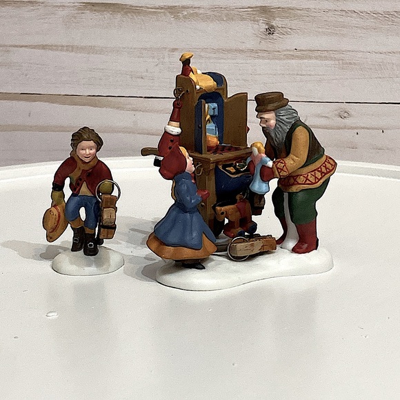 DEPARTMENT 56 - Christmas Bazaar Toy Vendor-Heritage Village-New England Village - Picture 1 of 9